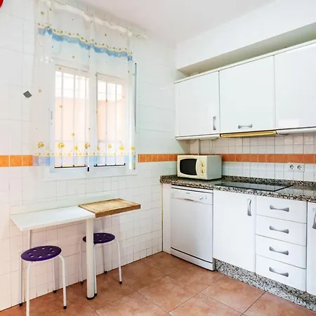 Holiday home Inviting House In With Shared Pool. *